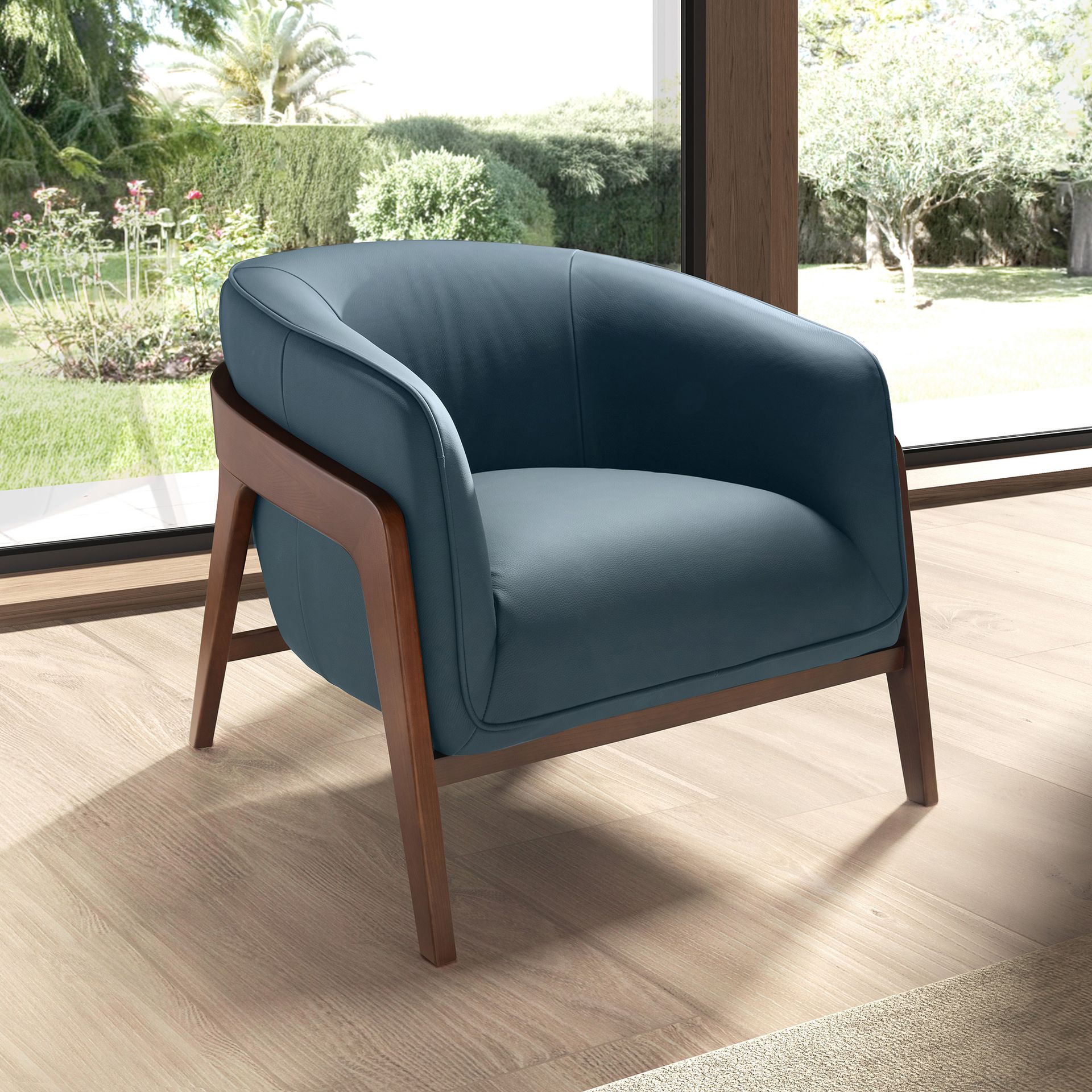 Fauteuil en cuir bleu pétrole – Angel Cerdá