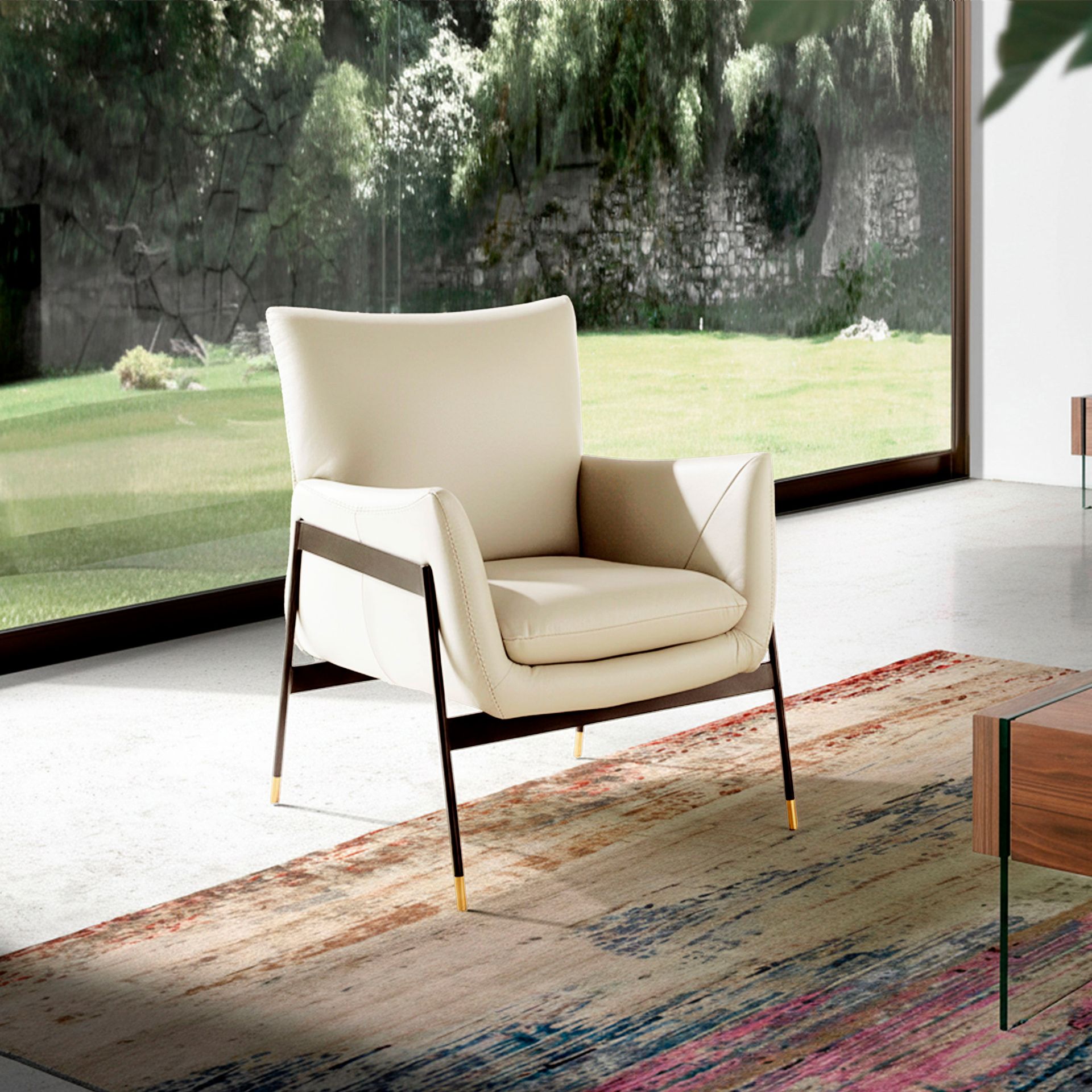 Fauteuil en cuir gris perle – Angel Cerdá
