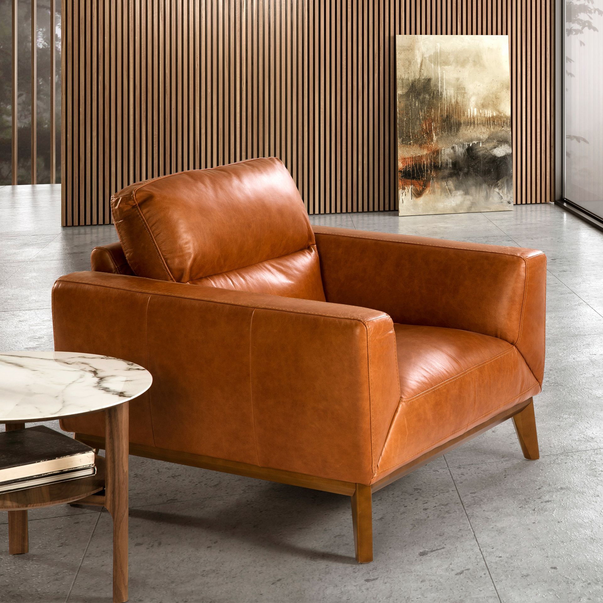 Fauteuil en cuir marron – Angel Cerdá