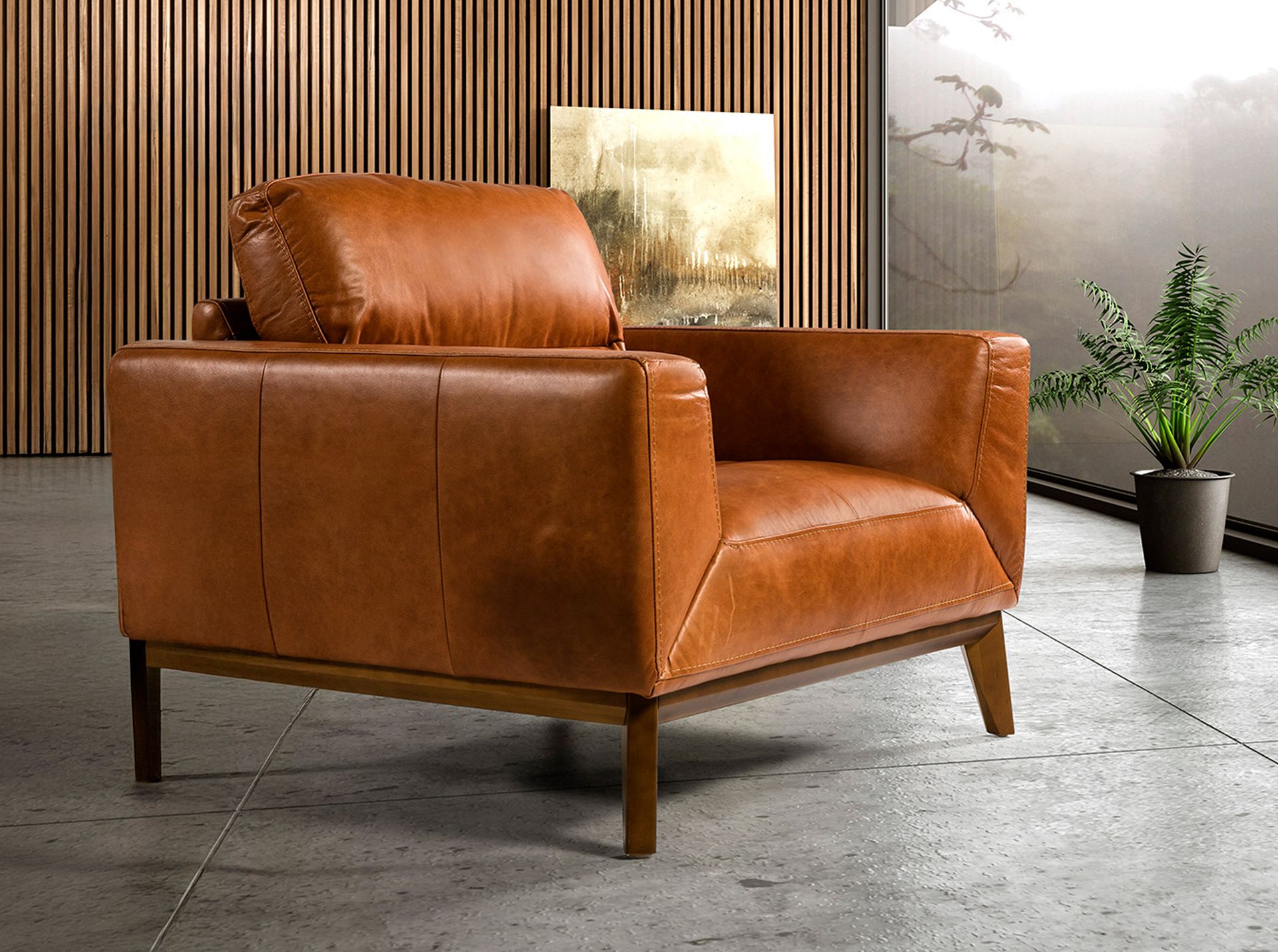 Fauteuil en cuir marron – Angel Cerdá