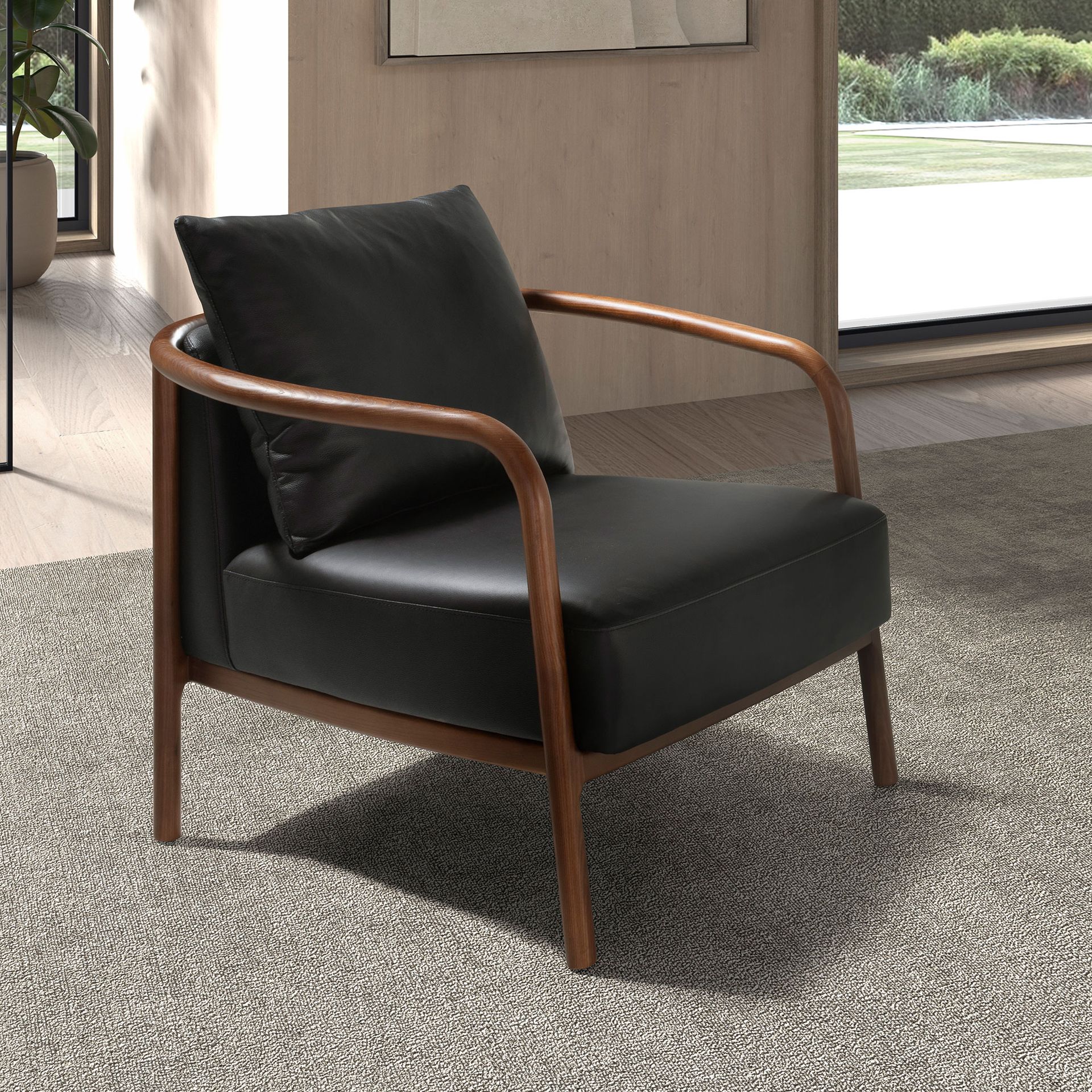 Fauteuil en cuir noir – Angel Cerdá