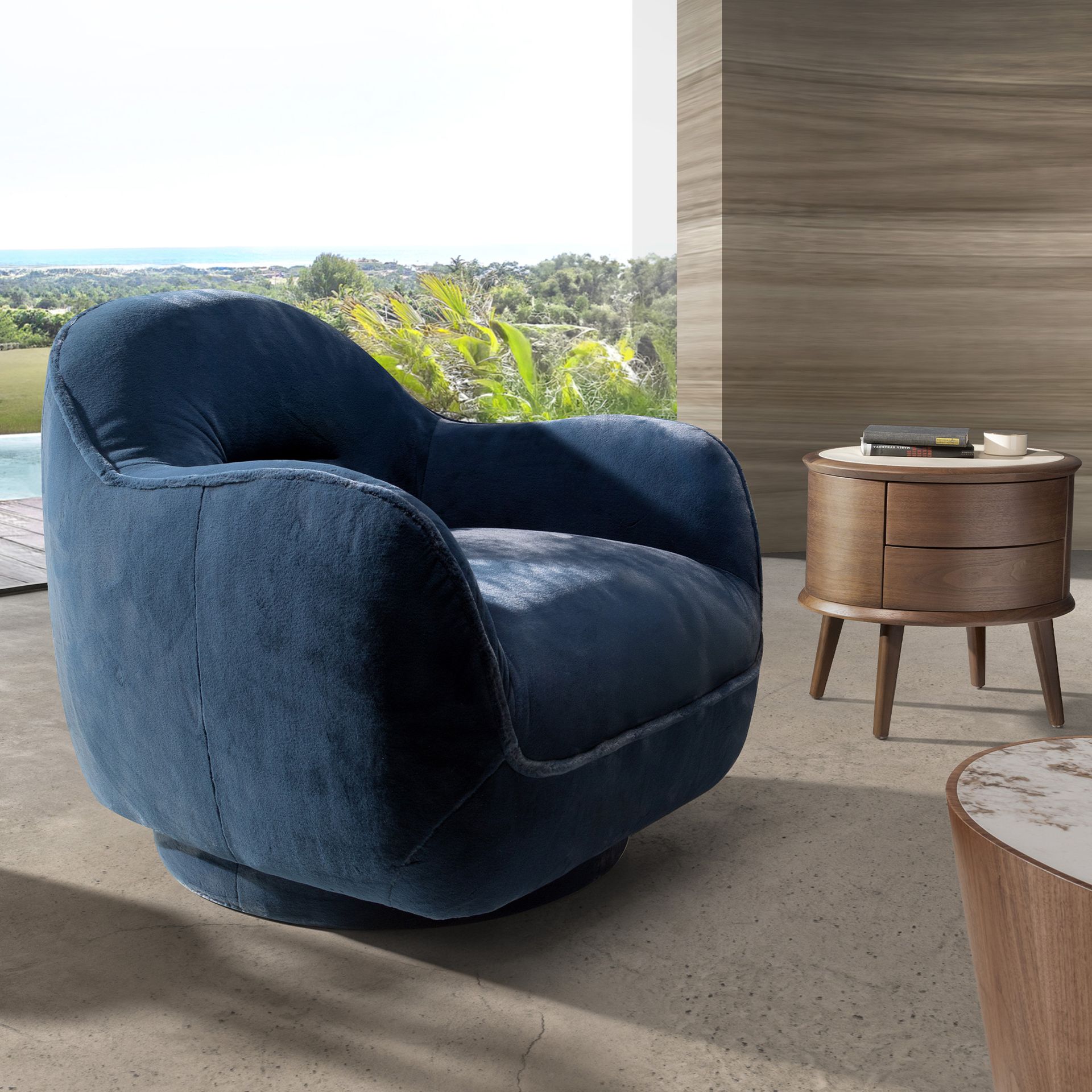 Fauteuil pivotant en velours bleu foncé – Angel Cerdá