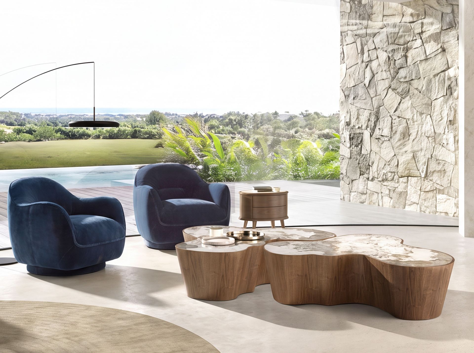 Fauteuil pivotant en velours bleu foncé – Angel Cerdá