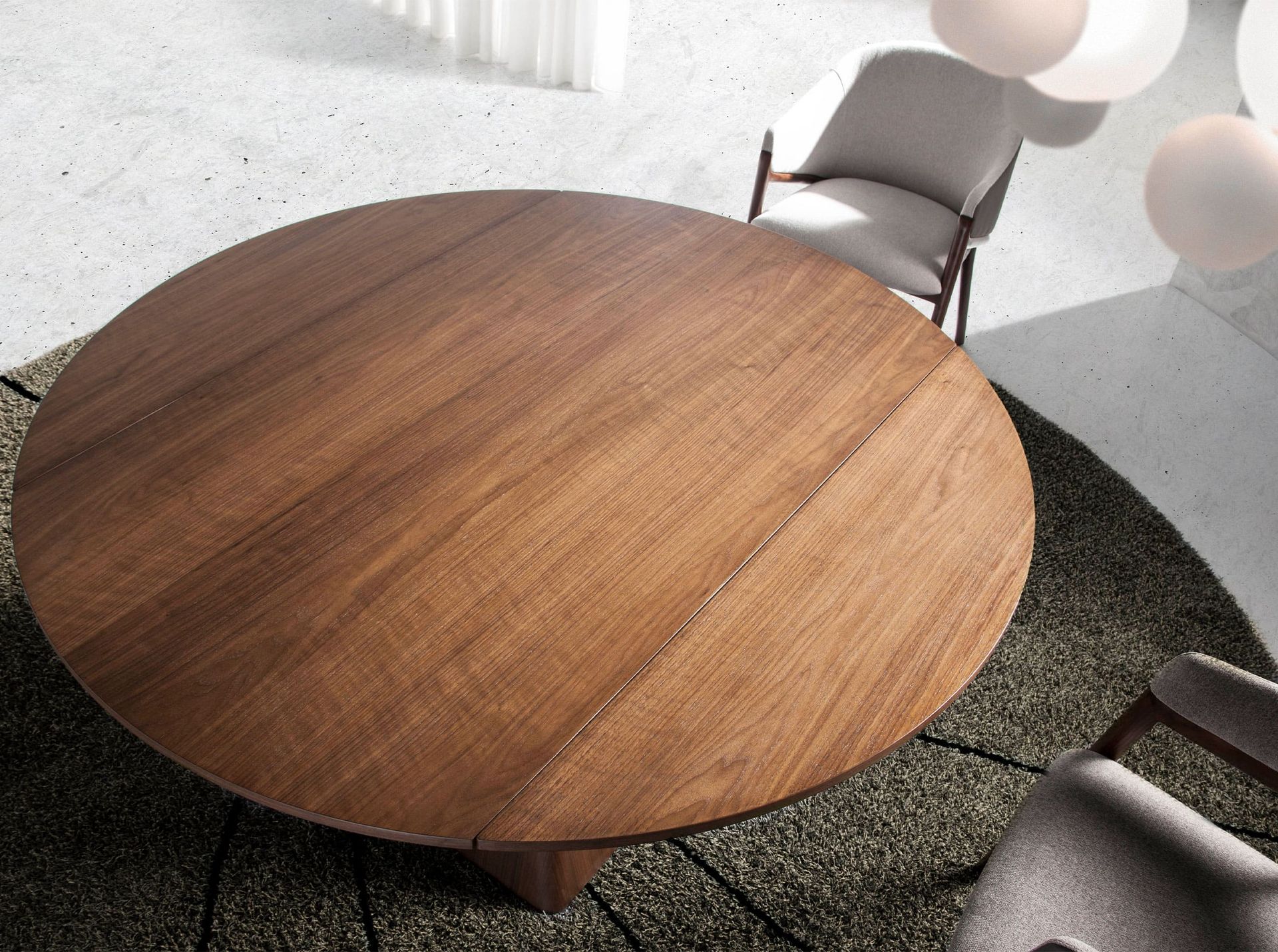Table à manger à rallonge ronde noyer – Angel Cerdá