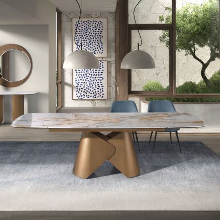 Table de salle à manger extensible ovale en forme de tonneau en marbre porcelanique et structure en acier coloris bronze – Angel Cerdá